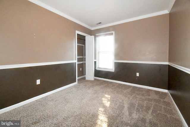 unfurnished bedroom featuring carpet and ornamental molding