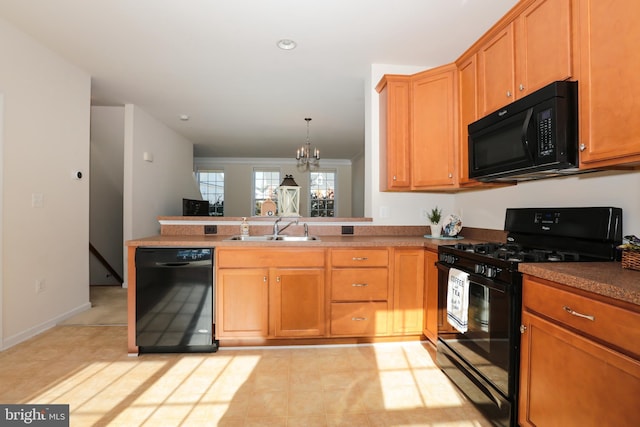 kitchen featuring pendant lighting, black appliances, an inviting chandelier, sink, and kitchen peninsula