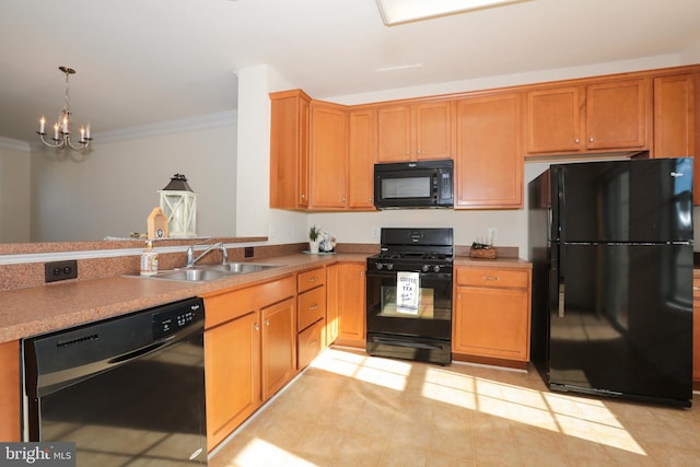 kitchen with black appliances, pendant lighting, a chandelier, crown molding, and sink