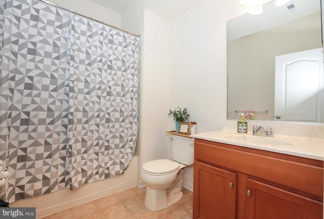 full bathroom featuring shower / bath combination with curtain, toilet, vanity, and tile patterned flooring