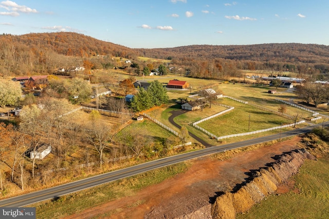 bird's eye view featuring a mountain view and a rural view