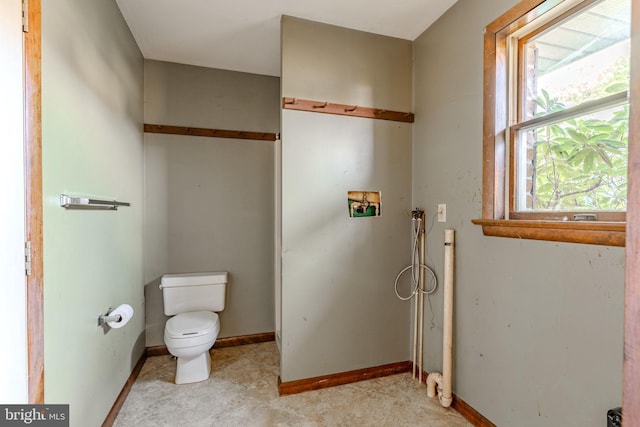 bathroom featuring toilet