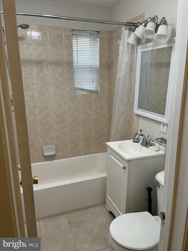 full bathroom with tile patterned floors, vanity, toilet, and shower / bathtub combination with curtain