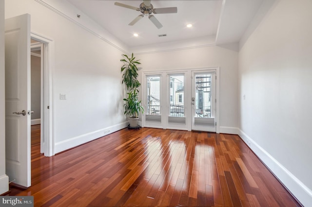 unfurnished room with wood-type flooring and ceiling fan