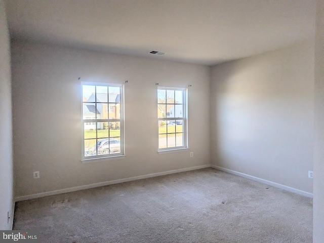 view of carpeted spare room