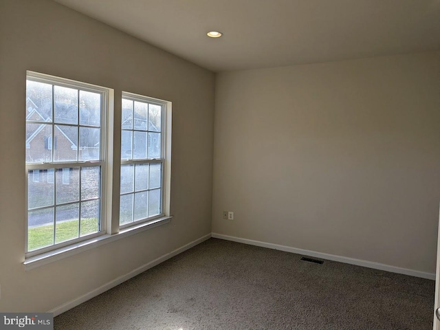 view of carpeted spare room