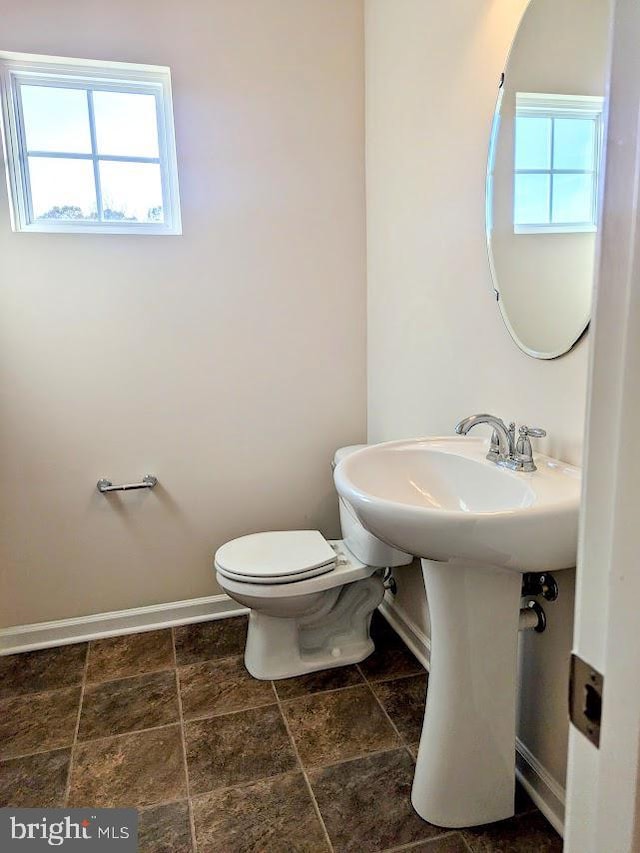 bathroom featuring toilet