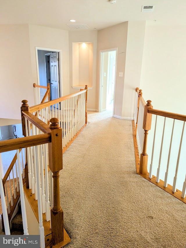 hallway with carpet