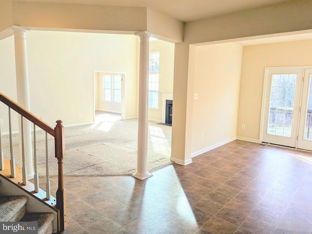 view of carpeted foyer