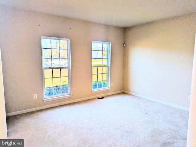 view of carpeted spare room