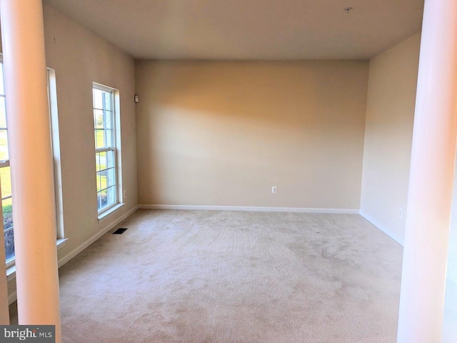 view of carpeted spare room