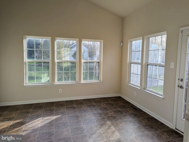 spare room with a healthy amount of sunlight