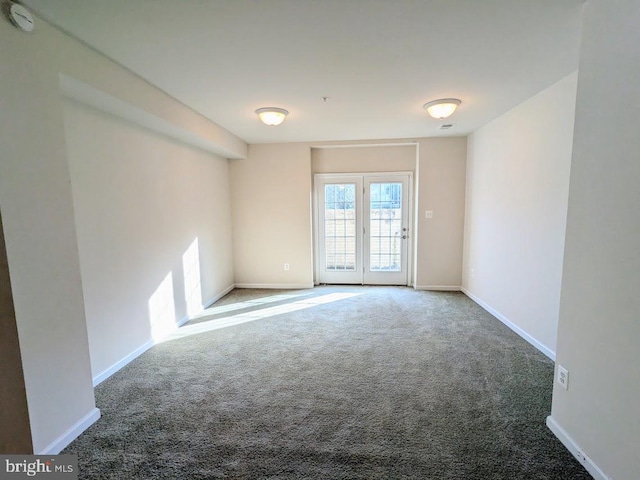 empty room with carpet flooring