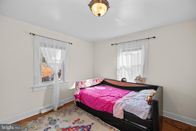 bedroom featuring hardwood / wood-style flooring