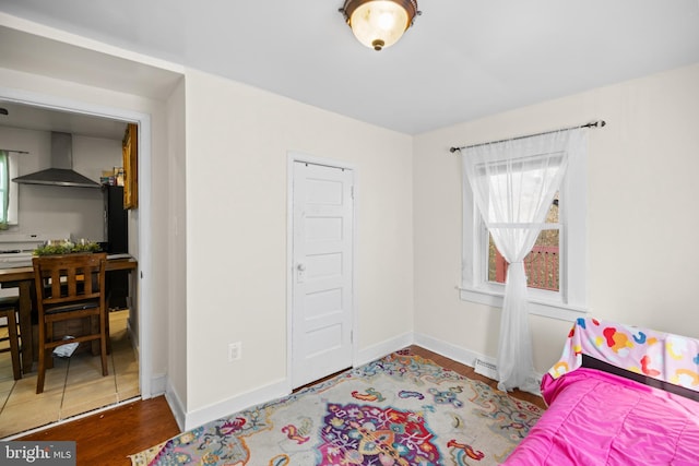 bedroom featuring wood-type flooring