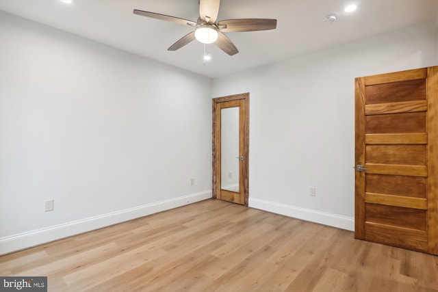 unfurnished bedroom with light hardwood / wood-style flooring and ceiling fan