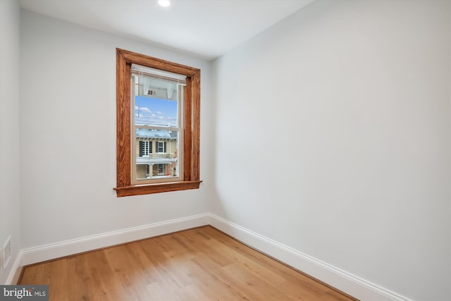 empty room featuring hardwood / wood-style floors