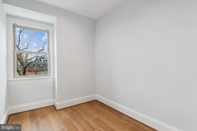 spare room with light hardwood / wood-style floors