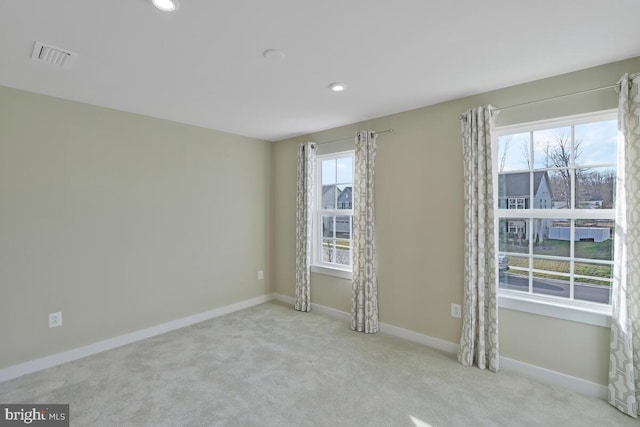 view of carpeted spare room