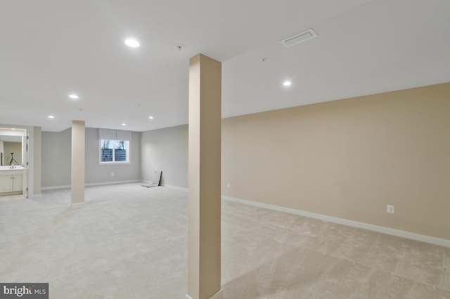 basement with light carpet