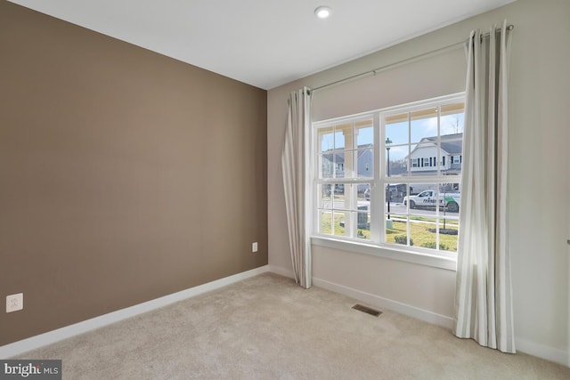 view of carpeted spare room