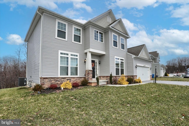 view of front facade featuring central air condition unit and a front yard