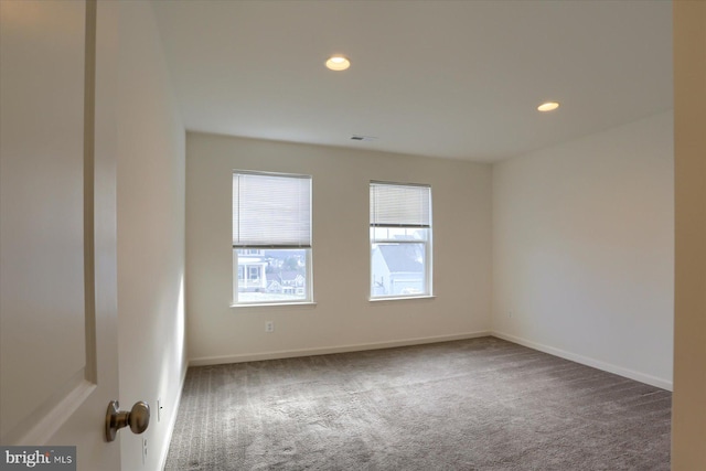 view of carpeted spare room