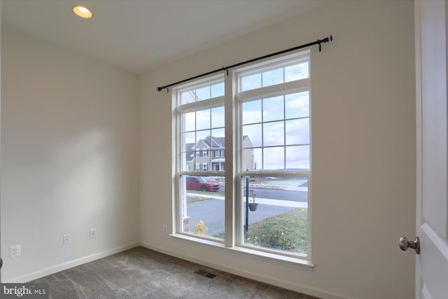 view of carpeted spare room