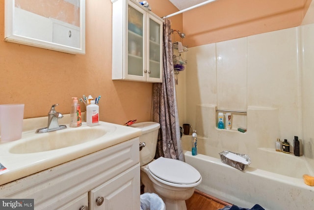 full bathroom featuring vanity, toilet, and shower / tub combo