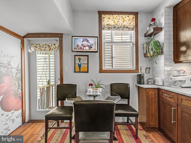 dining space featuring light hardwood / wood-style flooring