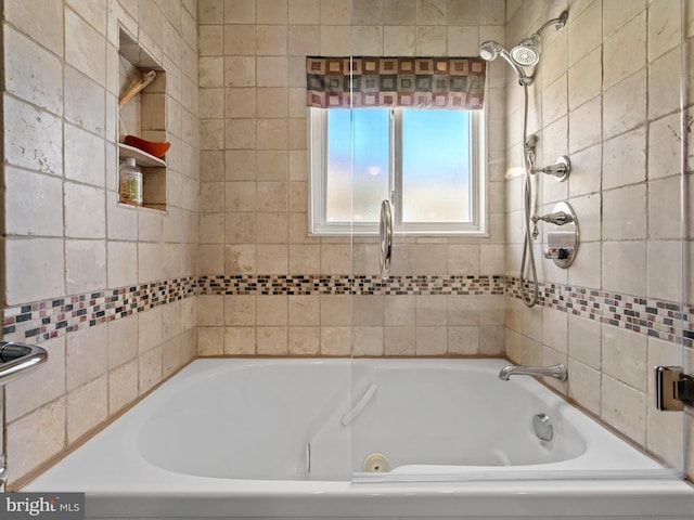 bathroom featuring a tub to relax in