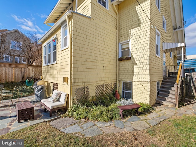 view of home's exterior featuring a patio