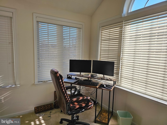 office featuring vaulted ceiling and baseboards