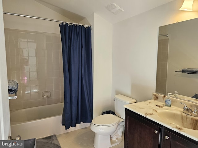 full bath with tile patterned flooring, toilet, visible vents, vanity, and shower / bath combo