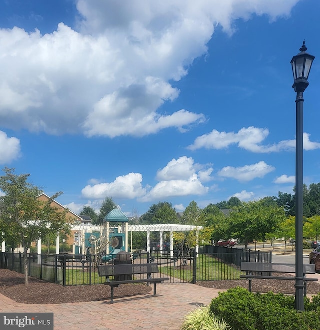 surrounding community with playground community and fence