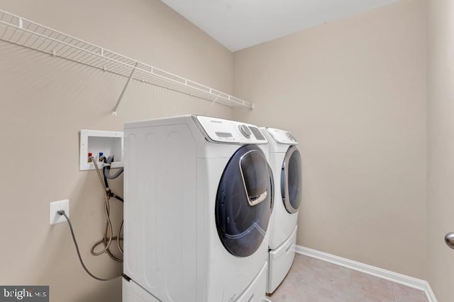 laundry room with washer and dryer