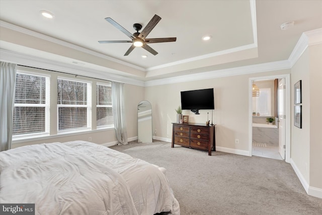 carpeted bedroom featuring ensuite bathroom, crown molding, and ceiling fan