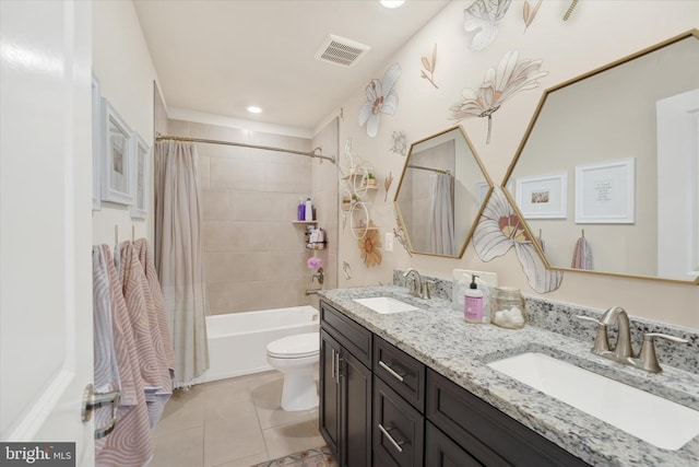 full bathroom with tile patterned floors, shower / bath combo, toilet, and vanity