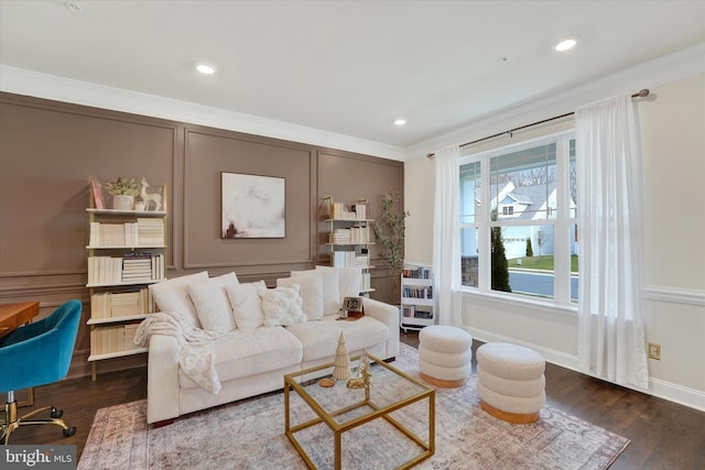 living room with crown molding and dark wood-type flooring