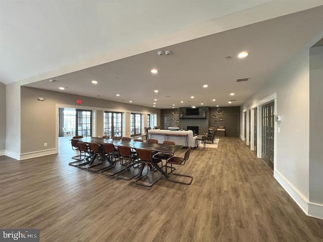 dining room with dark hardwood / wood-style floors