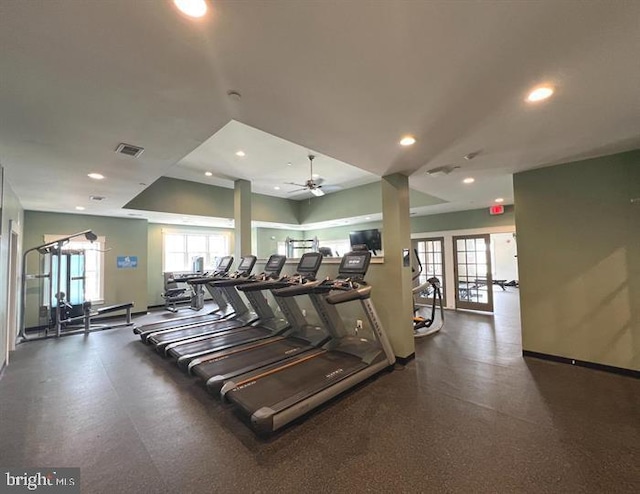 exercise room with plenty of natural light and ceiling fan