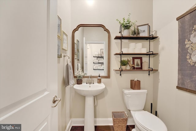 bathroom featuring toilet