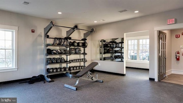 workout area featuring a wealth of natural light