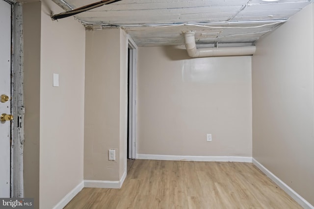 basement featuring light hardwood / wood-style floors