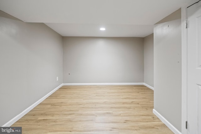 spare room featuring light hardwood / wood-style flooring