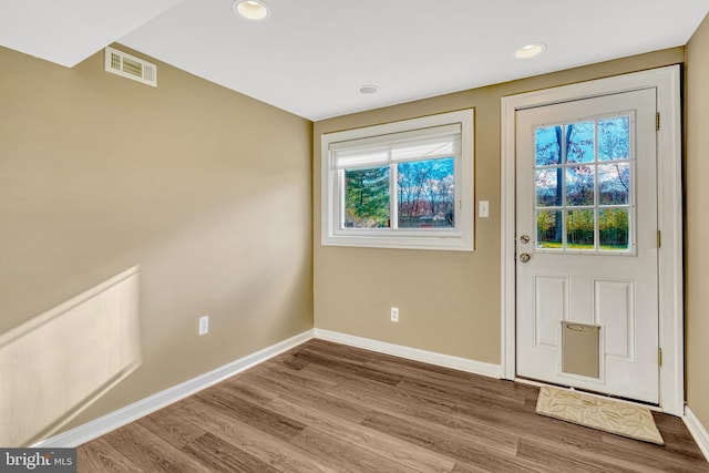 doorway featuring hardwood / wood-style floors