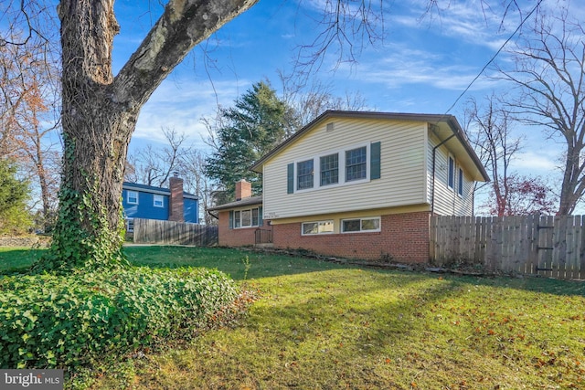 view of property exterior featuring a yard