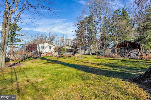 view of yard with an outdoor structure