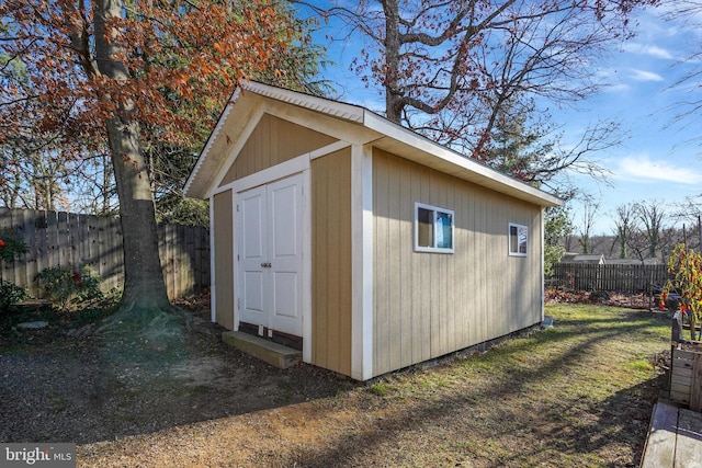 view of outdoor structure with a yard