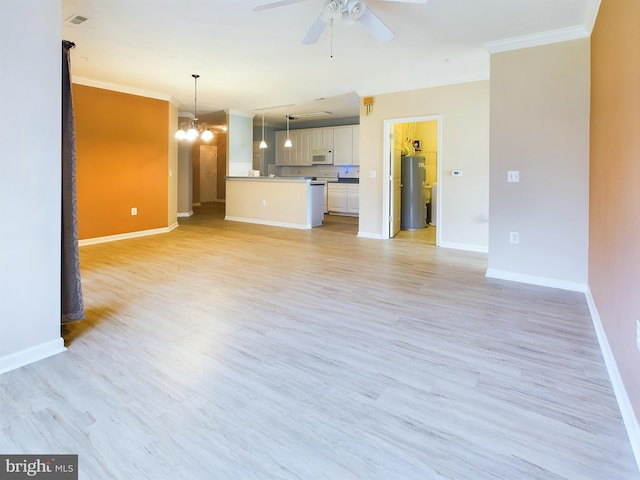 unfurnished living room featuring ceiling fan with notable chandelier, light wood-type flooring, ornamental molding, and water heater